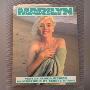 Marilyn Monroe book with newspaper article.